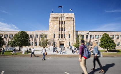 Students walking through a university campus 